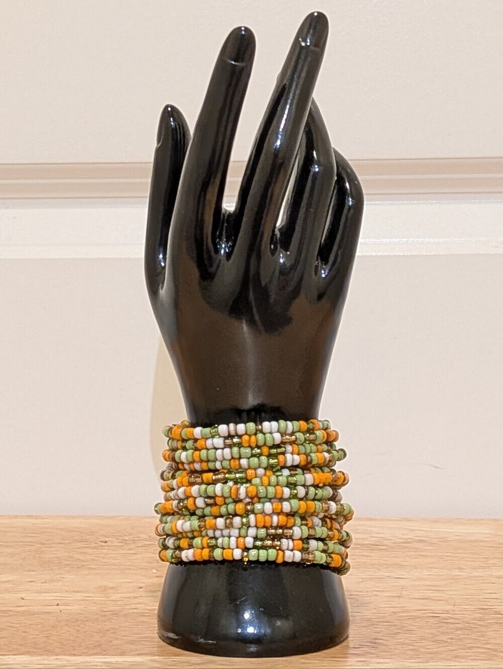 EUC 15 Strand Seed Beaded Green Orange and White Stretch Cuff Bracelet